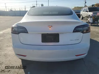2020 Tesla Model 3 Long Range z VIN 5YJ3E1EB4LF650258, wystawiony jako Copart lot #49267215 z przebiegiem 128 825 mil mil oraz Szkoda całkowita • Salvage title. Historia ofert i sprzedaży dostępna na DreamBid. Obrazek 6.