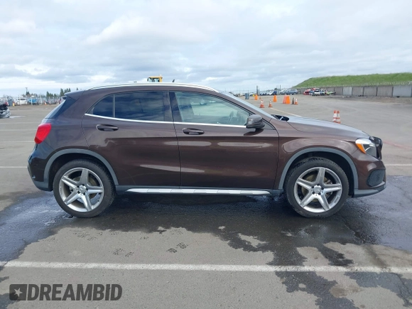 2015 Mercedes-Benz GLA 250 z VIN WDCTG4GB4FJ107864, wystawiony jako IAAI lot #41709927 z przebiegiem 102 070 mil mil oraz . Historia ofert i sprzedaży dostępna na DreamBid. Obrazek 14.