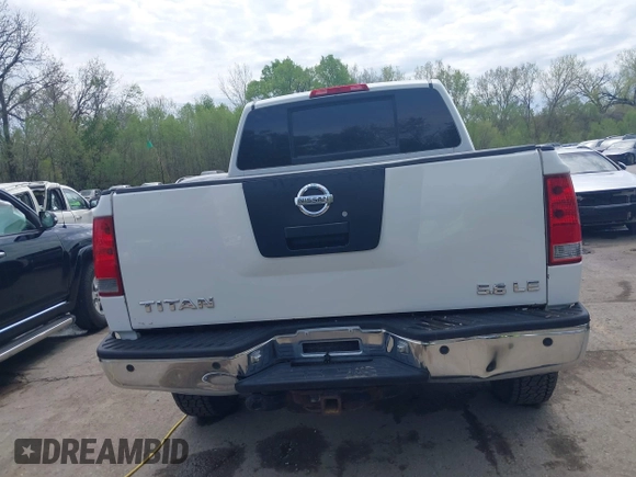 2005 Nissan Titan LE with VIN 1N6AA07BX5N525048, listed as a IAAI auction lot 41984150 with 242,321 mi miles. Bid and sale history available at carsss.com. Image 17.