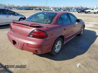 2005 Pontiac Grand Am SE with VIN 1G2NE52E45M202888, listed as a IAAI auction lot 41437235 with 65,968 mi miles. Bid and sale history available at carsss.com. Image 4.