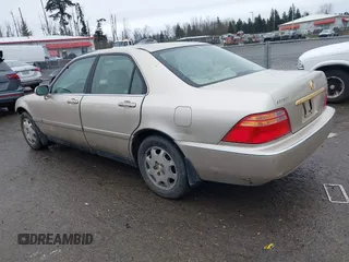 2000 Acura RL w/Navigation System with VIN JH4KA9662YC001438, listed as a IAAI auction lot 41522017 with 169,129 mi miles. Bid and sale history available at carsss.com. Image 3.