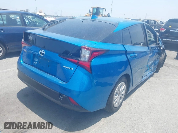 2021 Toyota Prius L Eco with VIN JTDKAMFUXM3134462, listed as a IAAI auction lot 42450931 with 89,239 mi miles and . Bid and sale history available at DreamBid. Image 4.