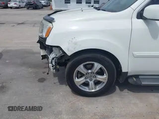 2014 Honda Pilot EX-L with VIN 5FNYF4H52EB055549, listed as a IAAI auction lot 42086456 with 292,594 mi miles and . Bid and sale history available at carsss.com. Image 6.