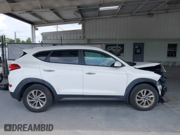 2016 Hyundai Tucson SE z VIN KM8J33A48GU192135, wystawiony jako IAAI lot #42216339 z przebiegiem 79 283 mil mil oraz . Historia ofert i sprzedaży dostępna na DreamBid. Obrazek 13.