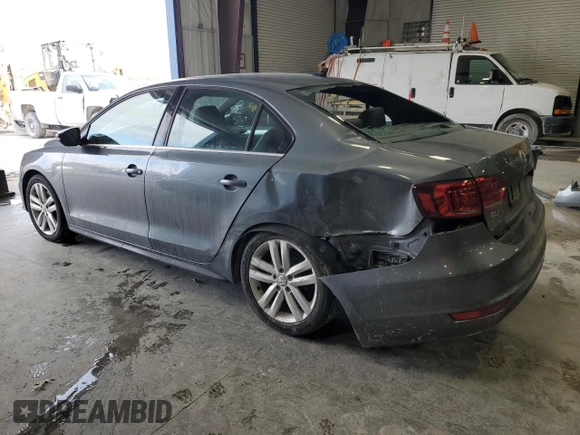 2014 Volkswagen Jetta GLI z VIN 3VW4T7AJ6EM398115, wystawiony jako Copart lot #89179925 z przebiegiem 81 264 mil mil oraz Szkoda całkowita • Salvage title. Historia ofert i sprzedaży dostępna na DreamBid. Obrazek 2.