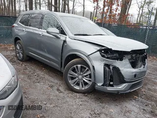 2025 Cadillac XT6 AWD Premium Luxury with VIN 1GYKPDRS8SZ121710, listed as a IAAI auction lot 41612526 with 4,703 mi miles and . Bid and sale history available at DreamBid. Image 1.