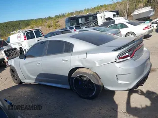 2021 Dodge Charger Scat Pack with VIN 2C3CDXGJ5MH539860, listed as a IAAI auction lot 41683146 with 21,361 mi miles and . Bid and sale history available at DreamBid. Image 14.