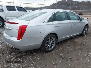 2013 Cadillac XTS Luxury with VIN 2G61P5S3XD9182910, listed as a IAAI auction lot 41940764 with 21,610 mi miles and . Bid and sale history available at DreamBid. Image 4.