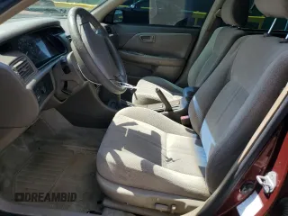 2000 Toyota Camry CE z VIN JT2BG22K4Y0449443, wystawiony jako Copart lot #58268475 z przebiegiem 292 853 mil mil oraz Szkoda całkowita • Salvage title. Historia ofert i sprzedaży dostępna na DreamBid. Obrazek 7.