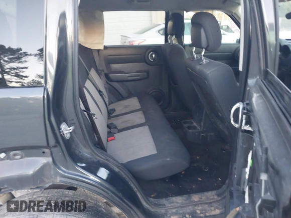 2010 Dodge Nitro SE with VIN 1D4PT2GK3AW137797, listed as a IAAI auction lot 41689701 with 182,452 mi miles. Bid and sale history available at carsss.com. Image 8.