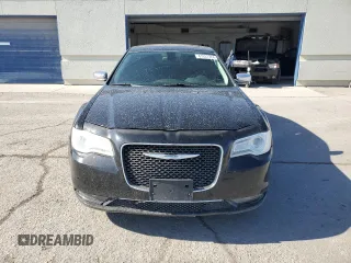 2015 Chrysler 300 C with VIN 2C3CCAET4FH772748, listed as a Copart auction lot 61331724 with 97,856 mi miles and Salvage Title. Bid and sale history available at DreamBid. Image 5.