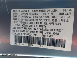 2007 Honda CR-V EX with VIN JHLRE38567C044218, listed as a IAAI auction lot 41960696 with 188,548 mi miles. Bid and sale history available at carsss.com. Image 9.