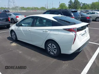 2017 Toyota Prius Two with VIN JTDKARFU7H3054054, listed as a IAAI auction lot 42028565 with 64,805 mi miles. Bid and sale history available at carsss.com. Image 3.
