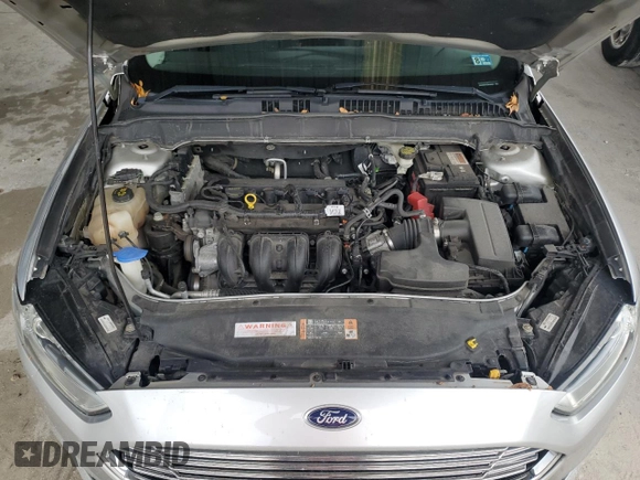 2016 Ford Fusion SE z VIN 3FA6P0H7XGR184094, wystawiony jako Copart lot #59615465 z przebiegiem 127 370 mil mil oraz Nie do naprawy • Non repairable. Historia ofert i sprzedaży dostępna na DreamBid. Obrazek 11.