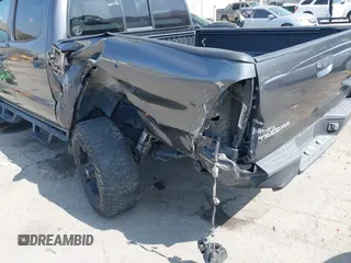 2013 Toyota Tacoma PreRunner z VIN 5TFJX4GN2DX018800, wystawiony jako IAAI lot #42304447 z przebiegiem 188 409 mil mil oraz . Historia ofert i sprzedaży dostępna na DreamBid. Obrazek 18.