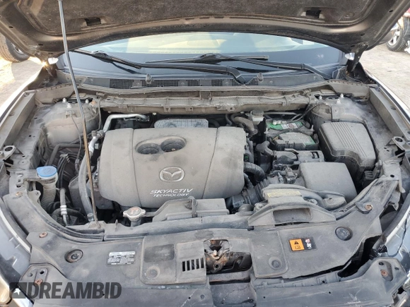 2016 Mazda CX-5 Sport with VIN JM3KE2BY9G0771969, listed as a Copart auction lot 80966064 with 99,348 mi miles and Salvage title. Bid and sale history available at DreamBid. Image 14.