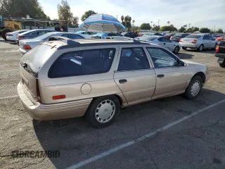 1993 Mercury Sable z VIN 1MELM5849PA655685, wystawiony jako Copart lot #85732984 z przebiegiem 98 081 mil mil oraz Tytuł czysty. Historia ofert i sprzedaży dostępna na DreamBid. Obrazek 3.