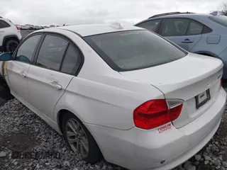 2006 BMW 3 Series 325i with VIN WBAVB13576PT05571, listed as a IAAI auction lot 41948698 with 1 mi miles. Bid and sale history available at carsss.com. Image 3.