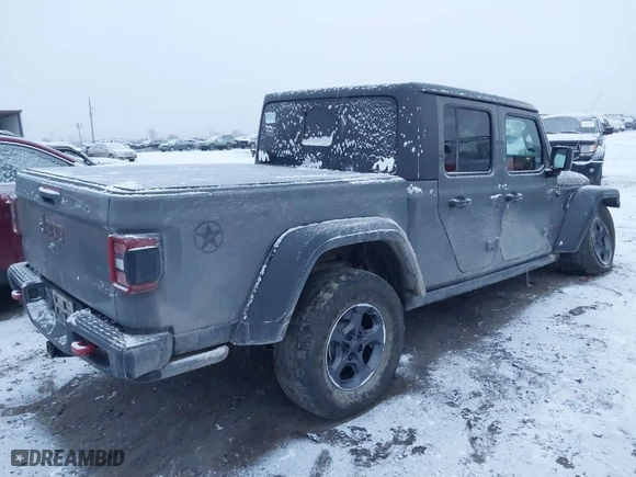 2020 Jeep Gladiator Rubicon with VIN 1C6JJTBG3LL146075, listed as a IAAI auction lot 41048823 with 130,318 mi miles. Bid and sale history available at carsss.com. Image 4.