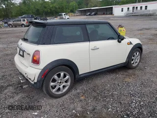2007 MINI Hardtop S with VIN WMWMF73557TL91653, listed as a IAAI auction lot 42095562 with 113,860 mi miles and . Bid and sale history available at DreamBid. Image 4.