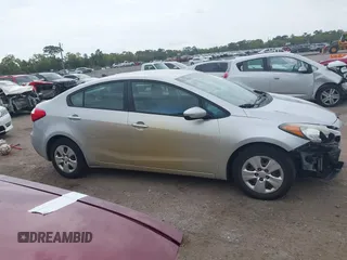 2015 Kia Forte LX with VIN KNAFK4A66F5407229, listed as a IAAI auction lot 41865696 with 124,232 mi miles. Bid and sale history available at carsss.com. Image 14.
