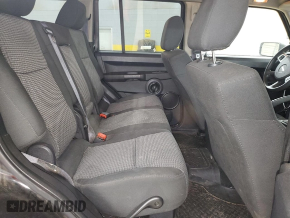 2008 Jeep Commander Sport z VIN 1J8HG48K08C135414, wystawiony jako Copart lot #52410675 z przebiegiem 200 480 mil mil oraz Szkoda całkowita • Salvage title. Historia ofert i sprzedaży dostępna na DreamBid. Obrazek 12.