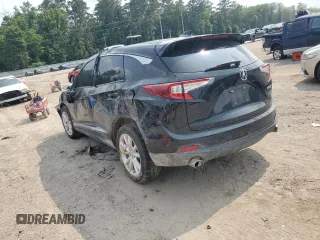 2021 Acura RDX with VIN 5J8TC1H32ML015579, listed as a Copart auction lot 59215965 with 76,411 mi miles and Salvage title. Bid and sale history available at DreamBid. Image 2.