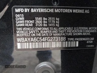 2015 BMW 7 Series 740i with VIN WBAYA6C54FG273188, listed as a IAAI auction lot 42563572 with 70,675 mi miles and . Bid and sale history available at DreamBid. Image 9.