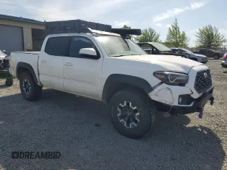 2022 Toyota Tacoma SR with VIN 3TYCZ5AN7NT056035, listed as a Copart auction lot 55510145 with 42,897 mi miles and Salvage title. Bid and sale history available at DreamBid. Image 4.