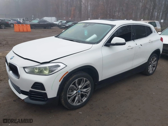 2022 BMW X2 sDrive28i with VIN WBXYH9C04N5U25732, listed as a IAAI auction lot 41015169 with 65,526 mi miles. Bid and sale history available at carsss.com. Image 2.