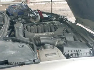 1998 Jaguar XK с VIN SAJGX224XWC019590, выставлен на аукционе IAAI как лот 42456804 с пробегом 157 696 миль миль и . История ставок и продаж доступна на DreamBid. Изображение 19.
