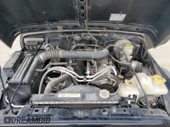2006 Jeep Wrangler X with VIN 1J4FA39SX6P719070, listed as a Copart auction lot 55598455 with 110,741 mi miles and Salvage title. Bid and sale history available at DreamBid. Image 12.