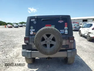 2016 Jeep Wrangler Unlimited Freedom с VIN 1C4BJWDG4GL153134, выставлен на аукционе Copart как лот 57954635 с пробегом 105 250 миль миль и Списание • Salvage title. История ставок и продаж доступна на DreamBid. Изображение 6.