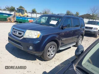 2010 Honda Pilot Touring with VIN 5FNYF3H84AB022700, listed as a IAAI auction lot 41689783 with 170,972 mi miles and . Bid and sale history available at DreamBid. Image 2.