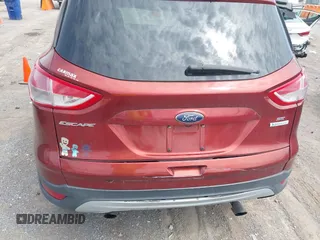 2014 Ford Escape SE with VIN 1FMCU0GX2EUB60526, listed as a IAAI auction lot 42060469 with 128,796 mi miles. Bid and sale history available at carsss.com. Image 6.