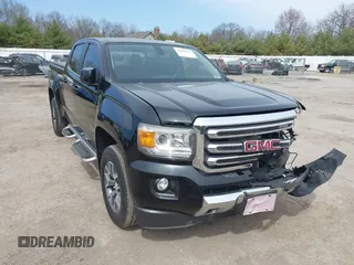 2015 GMC Canyon 4WD SLE z VIN 1GTG6BE34F1190075, wystawiony jako IAAI lot #42000316 z przebiegiem 177 640 mil mil oraz . Historia ofert i sprzedaży dostępna na DreamBid. Obrazek 1.