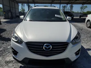 2016 Mazda CX-5 Grand Touring with VIN JM3KE4DY0G0819528, listed as a Copart auction lot 52343885 with 77,340 mi miles and Clean Title. Bid and sale history available at DreamBid. Image 5.