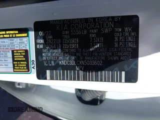 2022 Kia EV6 Wind with VIN KNDC3DLCXN5033602, listed as a IAAI auction lot 41489710 with 81,927 mi miles. Bid and sale history available at carsss.com. Image 9.
