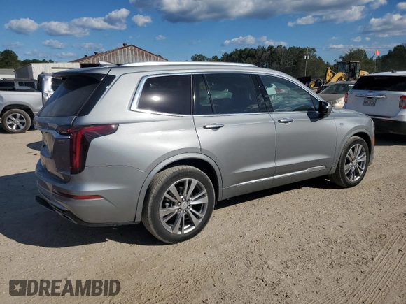 2023 Cadillac XT6 FWD Premium Luxury with VIN 1GYKPCRS0PZ231233, listed as a Copart auction lot 73210244 with 14,604 mi miles and Salvage Title. Bid and sale history available at carsss.com. Image 3.