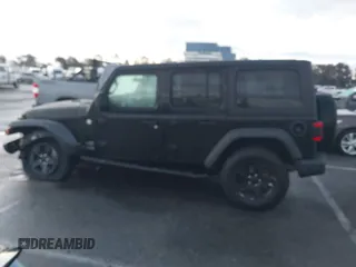 2018 Jeep Wrangler Unlimited Sport z VIN 1C4HJXDNXJW206732, wystawiony jako IAAI lot #41431655 z przebiegiem 38 949 mil mil oraz . Historia ofert i sprzedaży dostępna na DreamBid. Obrazek 14.
