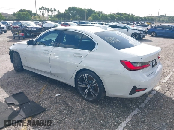 2021 BMW 3 Series 330i with VIN 3MW5R1J00M8B52627, listed as a IAAI auction lot 40722823 with 36,769 mi miles. Bid and sale history available at carsss.com. Image 3.