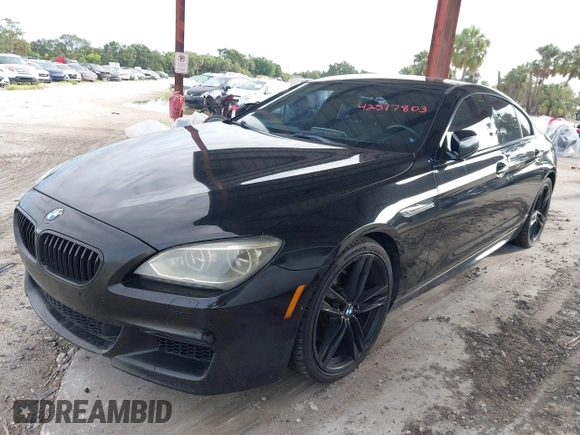 2014 BMW 6 Series 650i z VIN WBA6B2C57ED129681, wystawiony jako IAAI lot #42517803 z przebiegiem 208 644 mil mil oraz . Historia ofert i sprzedaży dostępna na DreamBid. Obrazek 20.
