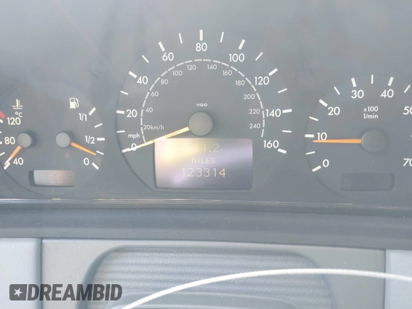 2001 Mercedes-Benz E-Class with VIN WDBJF65J61B373135, listed as a IAAI auction lot 42149598 with 123,314 mi miles. Bid and sale history available at carsss.com. Image 7.