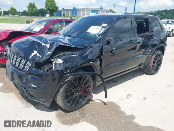 2021 Jeep Grand Cherokee Laredo X with VIN 1C4RJFAG2MC516111, listed as a IAAI auction lot 42222439 with 60,888 mi miles and . Bid and sale history available at DreamBid. Image 2.