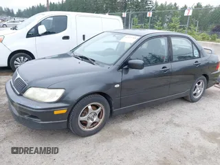 2002 Mitsubishi Lancer OZ-Rally z VIN JA3AJ86EX2U059845, wystawiony jako IAAI lot #42371709 z przebiegiem 207 665 mil mil oraz . Historia ofert i sprzedaży dostępna na DreamBid. Obrazek 2.