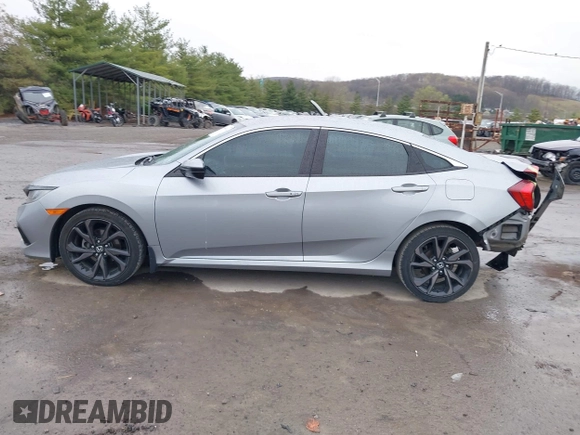 2019 Honda Civic Sport with VIN 19XFC2F81KE034047, listed as a IAAI auction lot 41995614 with 91,303 mi miles and . Bid and sale history available at DreamBid. Image 15.