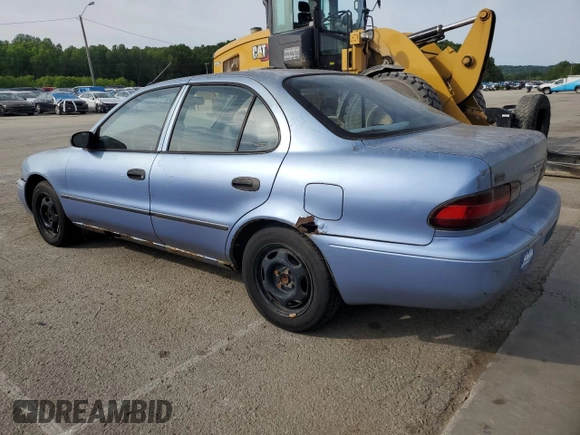 1996 Geo Prizm LSi z VIN 1Y1SK5262TZ041811, wystawiony jako Copart lot #56417875 z przebiegiem 185 771 mil mil oraz Tytuł czysty. Historia ofert i sprzedaży dostępna na DreamBid. Obrazek 2.