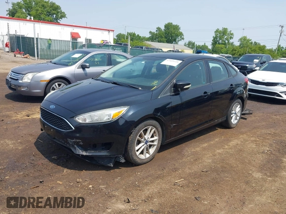 2017 Ford Focus SE with VIN 1FADP3F25HL292056, listed as a IAAI auction lot 42409320 with 102,956 mi miles and . Bid and sale history available at DreamBid. Image 2.