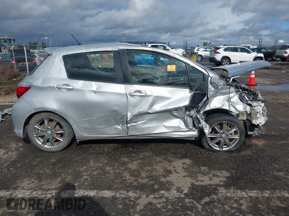 2014 Toyota Yaris L with VIN JTDKTUD33ED582669, listed as a IAAI auction lot 41573696 with Not Provided miles and . Bid and sale history available at DreamBid. Image 13.