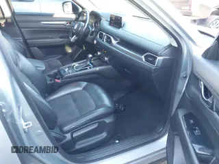 2018 Mazda CX-5 Touring with VIN JM3KFBCM6J0363767, listed as a IAAI auction lot 41776614 with 139,507 mi miles. Bid and sale history available at carsss.com. Image 5.